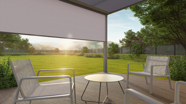 Simple outdoor furniture set standing on a modern patio, beautiful landscape view